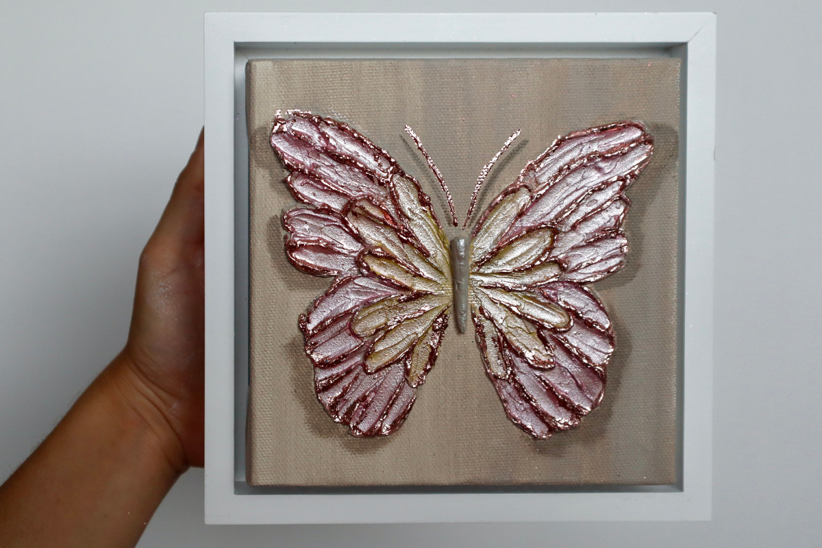 Rose Gold Open Wing Butterfly on Distressed Gray Canvas