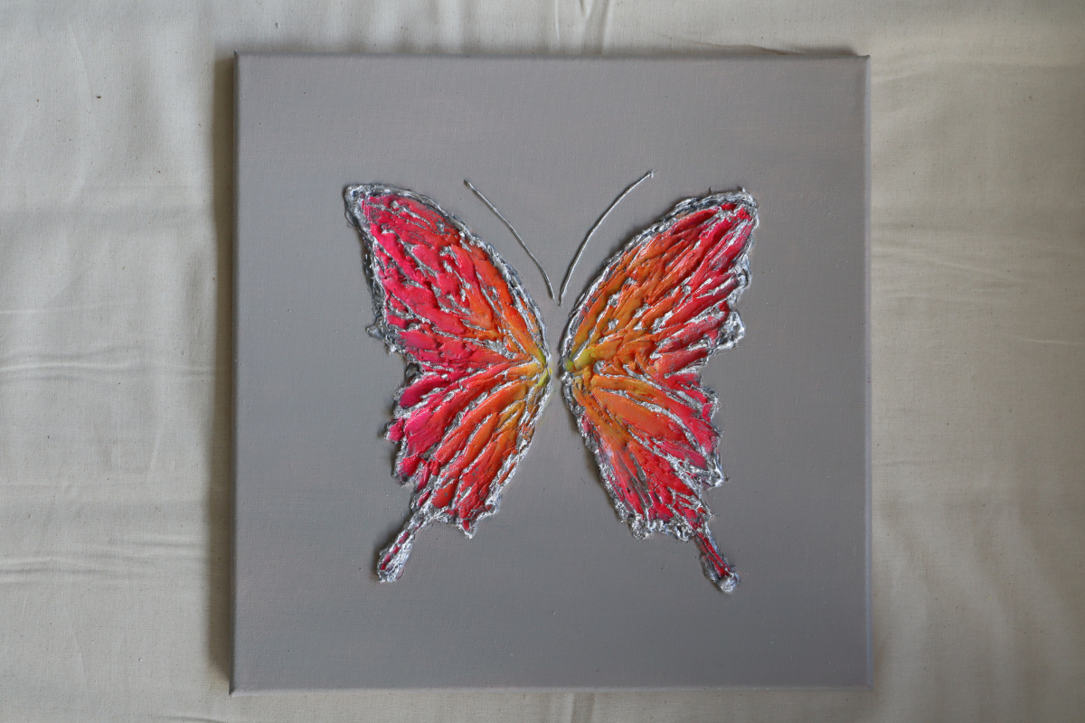 Multicolor Peach Butterfly on Light Gray Background
