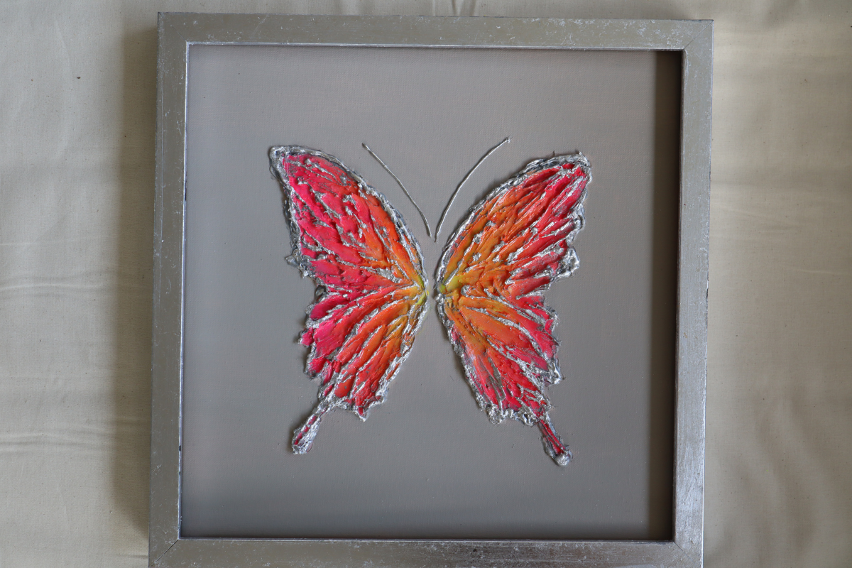 Multicolor Peach Butterfly on Light Gray Background