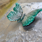 Green 3D Butterfly on Silver Background