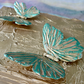 Teal & Gold 3D Butterfly on Gold Background