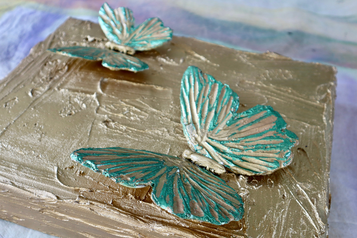 Teal & Gold 3D Butterfly on Gold Background