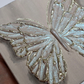 Seafoam Sparkle Open Wing Butterfly on Distressed Gray Canvas