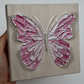 Taffy Pink Open Wing Butterfly on Distressed Gray Canvas