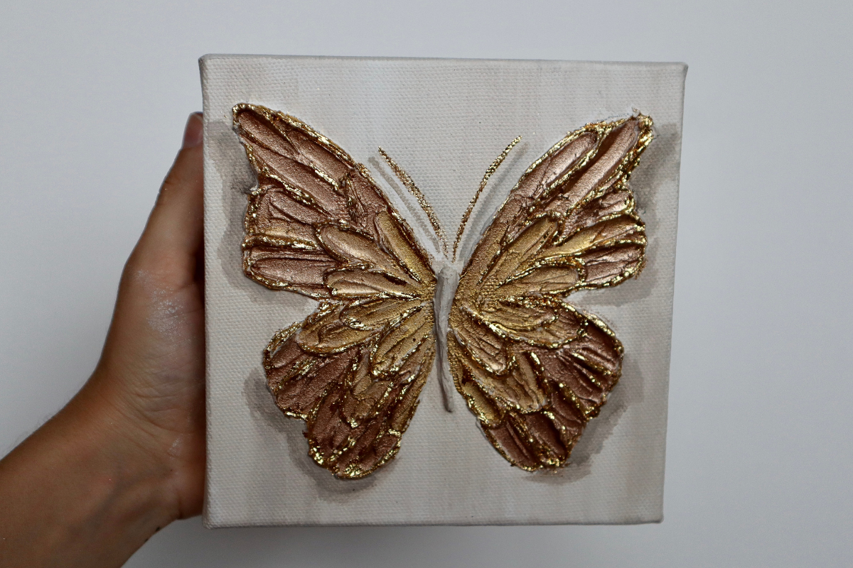 Tawny Open Wing Butterfly on Distressed Gray Canvas